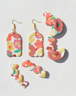 Flat Wavy Graphic White Floral Drop Earrings